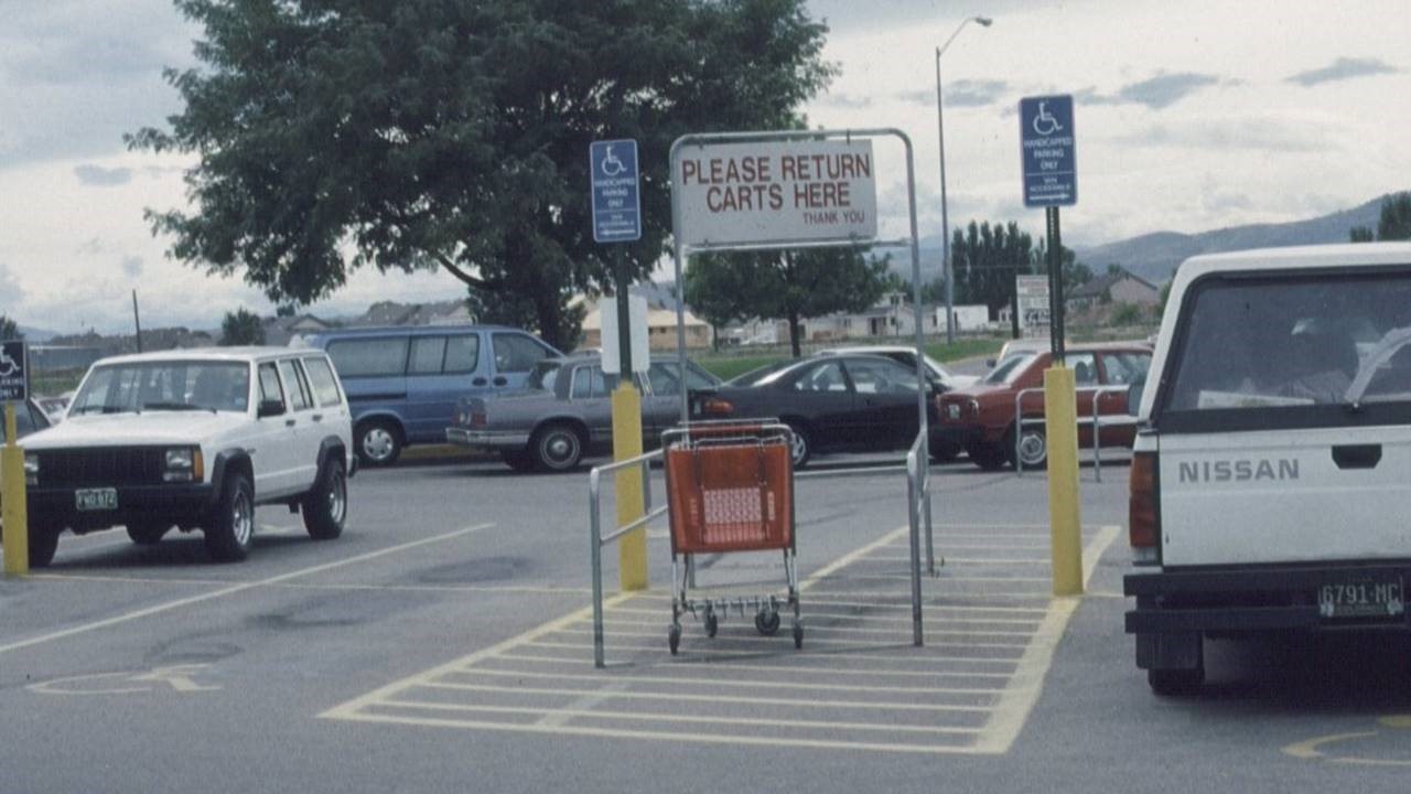 Cart return in access aisle of accessible space