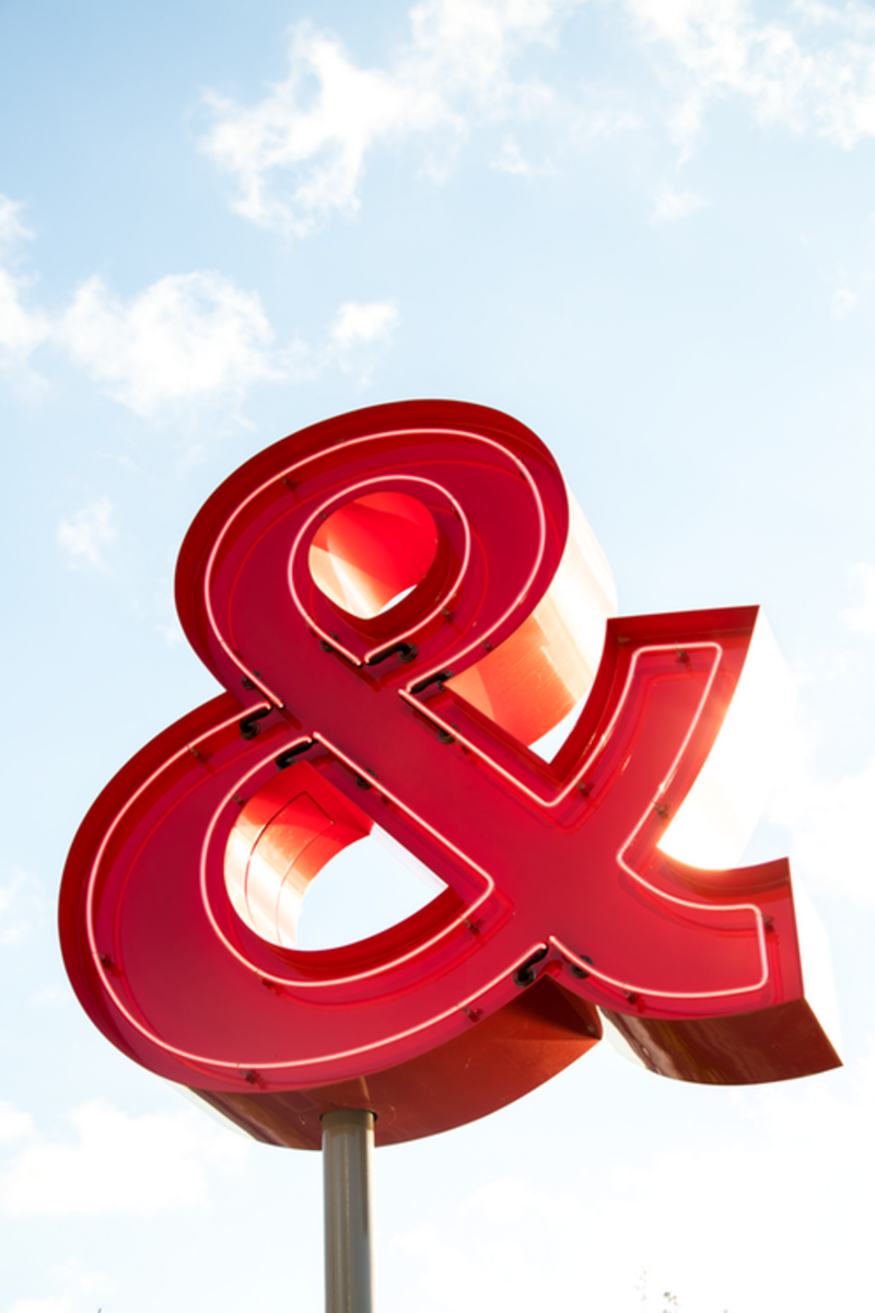 A large red ampersand sign