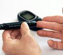 Person taking a diabetes test